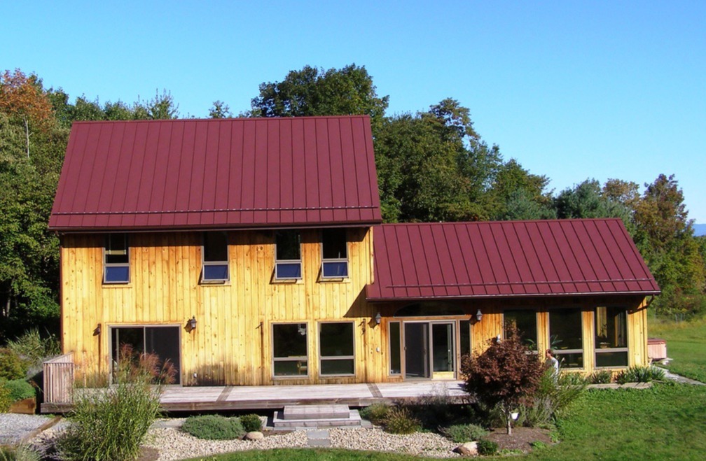 yellow house with a red roof